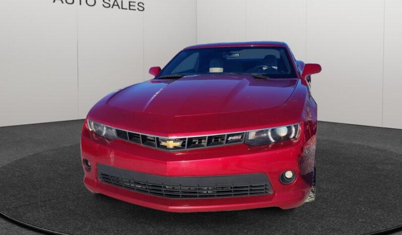 2014 Chevrolet Camaro 2LT in red, showcasing a sleek front view with distinctive grille and headlights, set against a neutral background, emphasizing its sporty design and performance.
