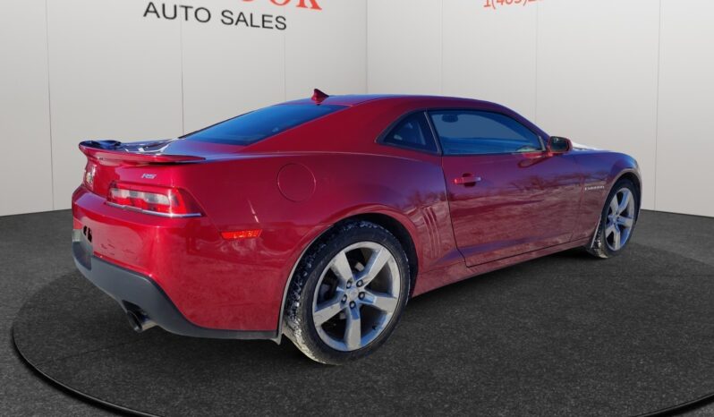 2014 Chevrolet Camaro 2LT in red, showcasing rear-right view with sleek coupe design and alloy wheels, emphasizing performance and style at Chinook Auto Sales.