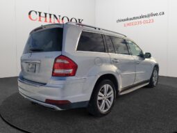 2010 Mercedes-Benz GL350 Diesel in silver, showcasing rear and right side view, displayed at Chinook Auto Sales, highlighting the vehicle's sleek design and dealership branding.