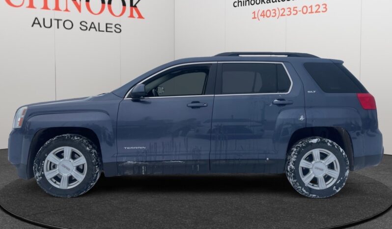 2014 GMC Terrain SLT in Deep Blue Pearl, side view, showcasing SUV design and features, available at Chinook Auto Sales for CAD $9,995.