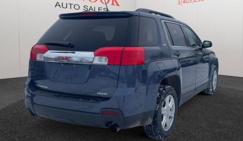 2014 GMC Terrain SLT in Deep Blue Pearl, showcasing rear view with AWD badge, displayed at Chinook Auto Sales, highlighting used family SUV features.