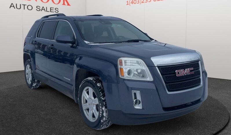 2014 GMC Terrain SLT in Deep Blue Pearl, showcasing family-friendly SUV design, featured at Chinook Auto Sales, Calgary.