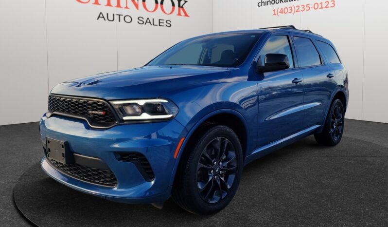 2023 Dodge Durango GT AWD in blue, showcasing sleek design and sporty features at Chinook Auto Sales, highlighting performance and suitability for Calgary's driving conditions.