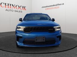 2015 Ford Escape SE in blue, front view, showcasing sleek design and dealership branding from Chinook Auto Sales.