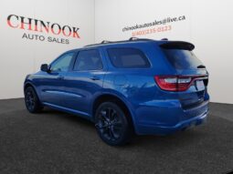 2015 Ford Escape SE in blue, showcasing rear left view, displayed at Chinook Auto Sales with dealership branding.