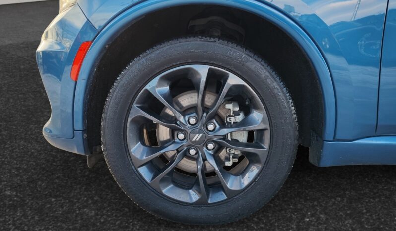 2023 Dodge Durango GT AWD front left wheel showcasing stylish alloy rim and tire, emphasizing performance and design features.