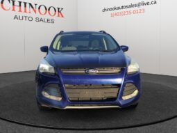2015 Ford Escape SE in blue, front view, showcasing the SUV's design and features, with Chinook Auto Sales branding in background.