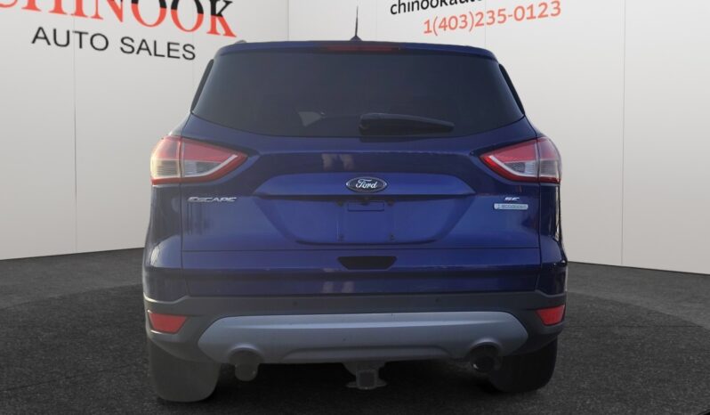 2015 Ford Escape SE in blue, rear view showcasing SUV design and features, displayed by Chinook Auto Sales.