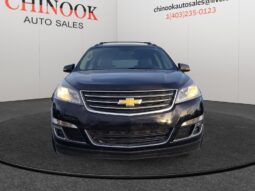 2015 Ford Escape SE SUV in blue, displayed front view at Chinook Auto Sales, showcasing dealership branding and contact information.