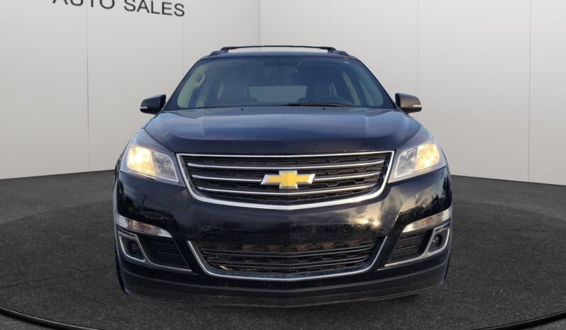 2017 Chevrolet Traverse 2LT AWD front view, showcasing black exterior and Chevrolet emblem, highlighting features relevant for Calgary families and winter driving conditions.