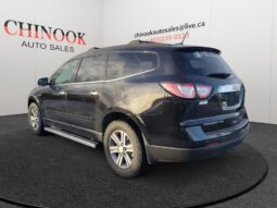 2015 Ford Escape SE SUV in blue, showcasing rear-left view, displayed at Chinook Auto Sales, emphasizing used vehicle features and pricing.