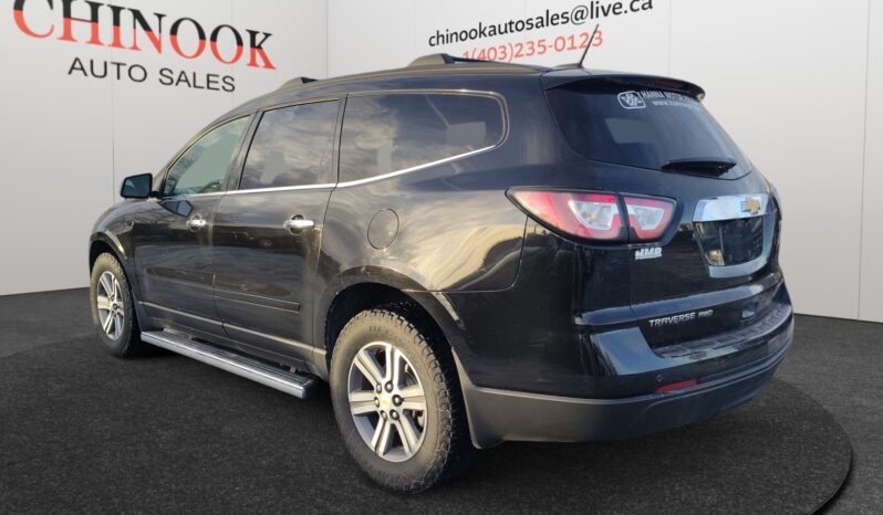 2017 Chevrolet Traverse 2LT AWD in black, showcasing rear-left view with all-wheel drive features and Chinook Auto Sales branding.