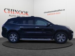 2017 Chevrolet Traverse 2LT AWD in black exterior, showcased at Chinook Auto Sales, highlighting its sleek design and suitability for Calgary families.