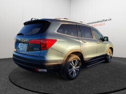 2015 Ford Escape SE SUV in blue, showcasing rear-right view, highlighting design and features, available for CAD $8,998 at Chinook Auto Sales.