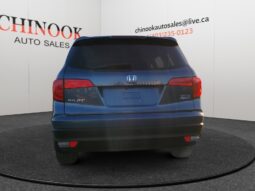 2016 Honda Pilot EXL-R in blue, rear view showcasing SUV design, dealership branding from Chinook Auto Sales, highlighting family-friendly features and 4WD capability.